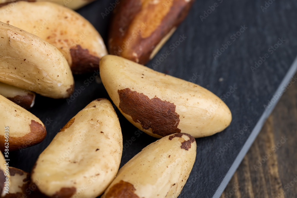 Brazil nuts peeled from the shell on the table Brazil nuts peeled from the shell on the table