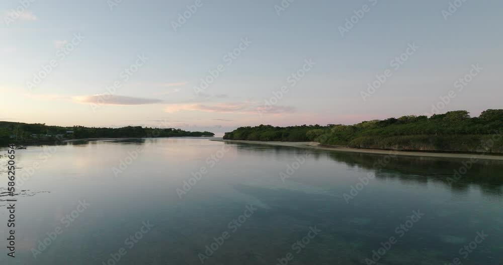 Aerial Forward Beautiful View Of Green Islands, Drone Flying Forward Over Tranquil Sea During Sunset - Nadi, Fiji Aerial Forward Beautiful View Of Green Islands, Drone Flying Forward Over Tranquil Sea During Sunset - Nadi, Fiji