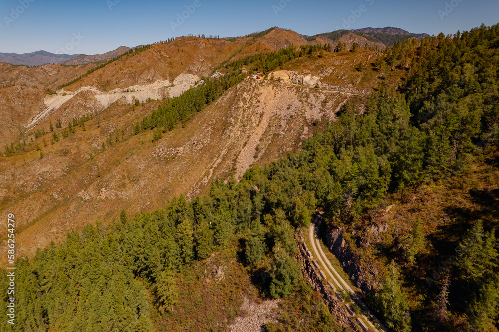 Naklejka premium Aerial view Autumn landscape travel of Altai mountains Russia meander road