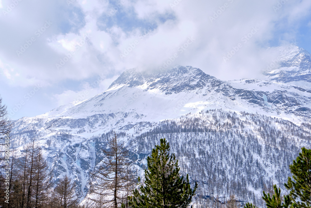 Canton Graubunden, Switzerland : Landscape in Alp Grum train station (Bernina express) during winter season