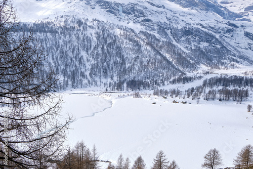 Canton Graubunden, Switzerland : Landscape in Alp Grum train station (Bernina express) during winter season © Matteo