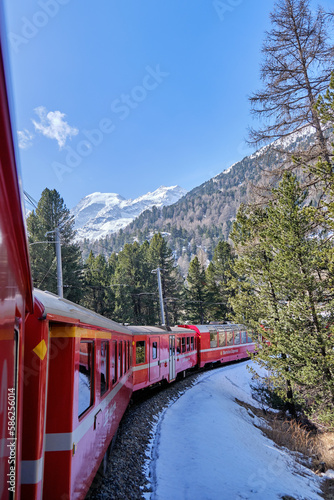 The famous Swiss mountain train of Bernina Express crossed italian and swiss Alps