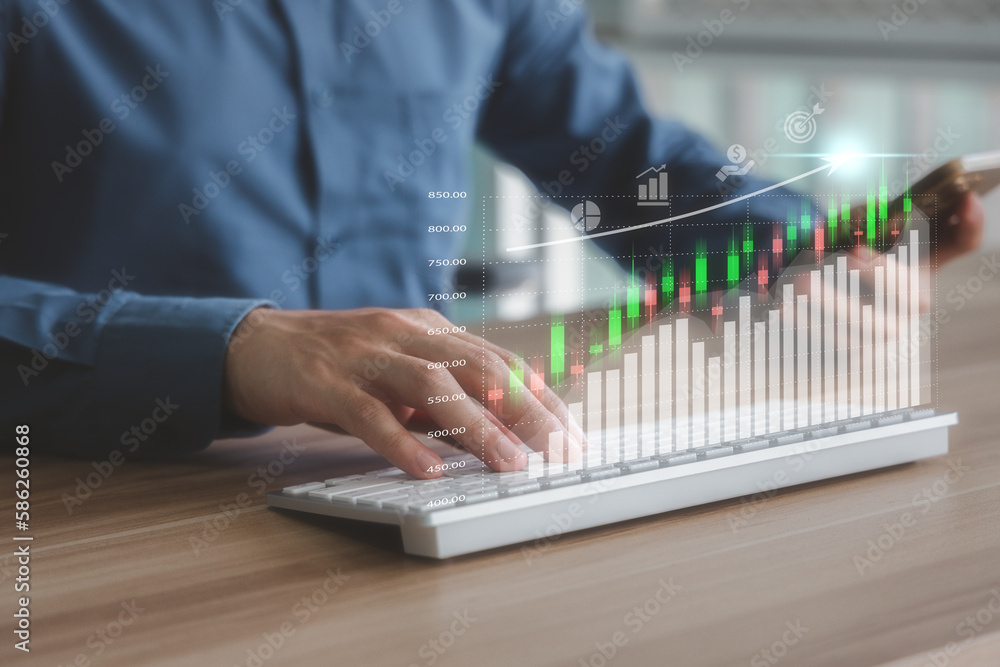Stock market investment, business planning and strategy concept. Man analyzing financial data graph and candlestick chart of stock. Stock market investment, business planning and strategy concept. Man analyzing financial data graph and candlestick chart of stock.