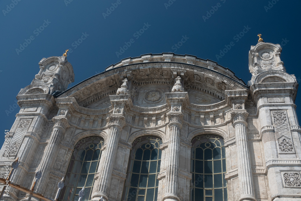 Detail of Ortakoy Mosque also known as Büyük Mecidiye Camii in Beşiktaş, Istanbul, Turkey. It was built in 1853 in baroque style. Rococo and Hellenistic architecture heritage of Ottoman empire