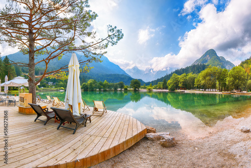 Incredible landscape on Jasna lake with beautiful reflections of the mountains. photo