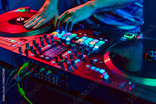 Bild auf Leinwand Close up of dj console mixer during concert in the club