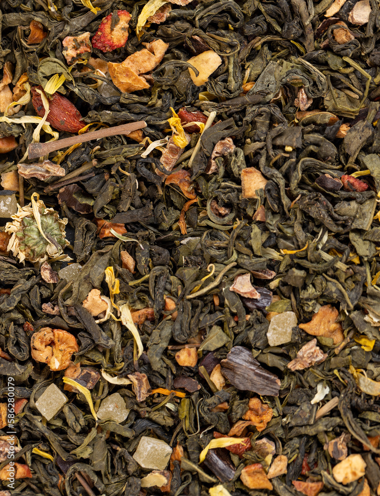 fresh green tea with pieces of fruit and berries fresh green tea with pieces of fruit and berries