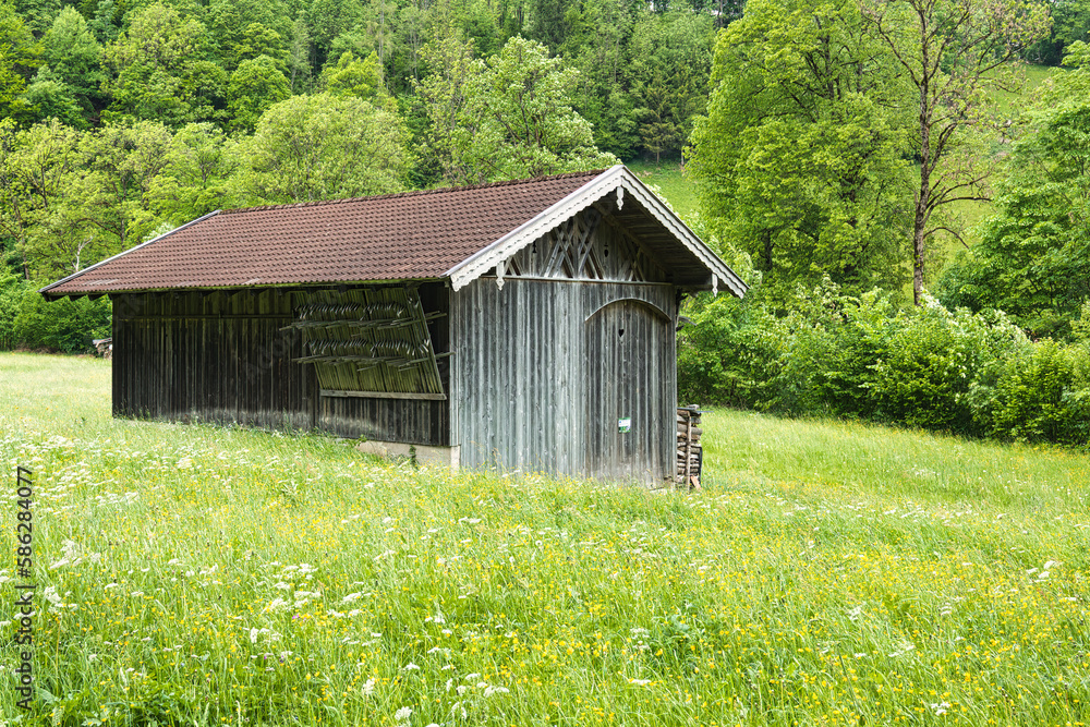 Eine bayrische Almhuette. An Wodden House from bavaria Eine bayrische Almhuette. An Wodden House from bavaria