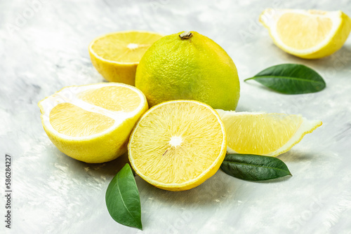 bergamots and leaves on a light background. banner, menu, recipe place for text, top view photo