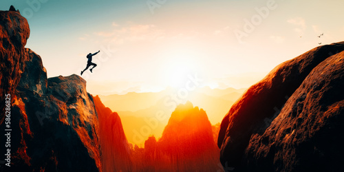 Man jumping over precipice between two rocky mountains 