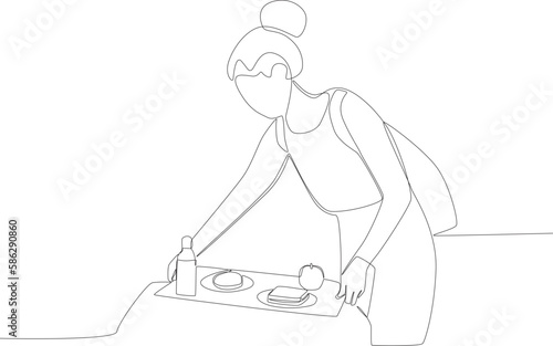 A woman preparing breakfast at school. Lunch at school one line drawing
