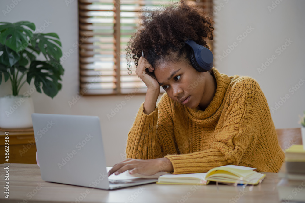 Young African American businesswoman sitting at home, stressed, tired, overworked, Young African American businesswoman sitting at home, stressed, tired, overworked,