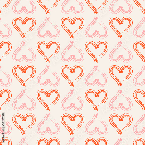 Hand drawn pink and red hearts seamless pattern on beige  background. Simple shapes for wrapping paper, wallpaper, fabric, textile