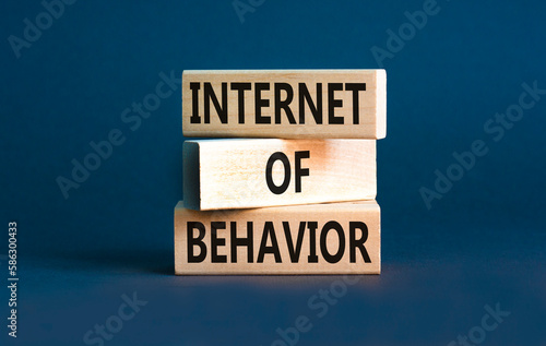 Internet of behavior symbol. Concept words Internet of behavior on wooden block on a beautiful grey table grey background. Business Internet of behavior concept. Copy space. © Dzmitry
