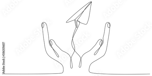 Continuous line drawing hands holding flying paper airplane. Vector illustration isolated on white.