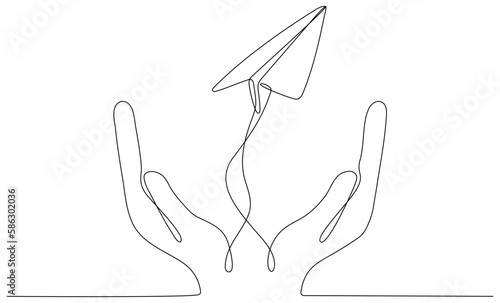 Continuous line drawing hands holding flying paper airplane. Vector illustration isolated on white.