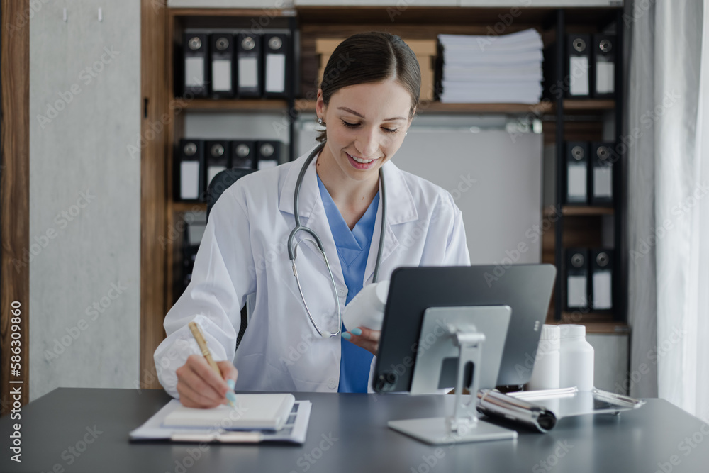 Doctor woman and stethoscope with medicine pills on desk. healthcare and medical concepts. Doctor woman and stethoscope with medicine pills on desk. healthcare and medical concepts.