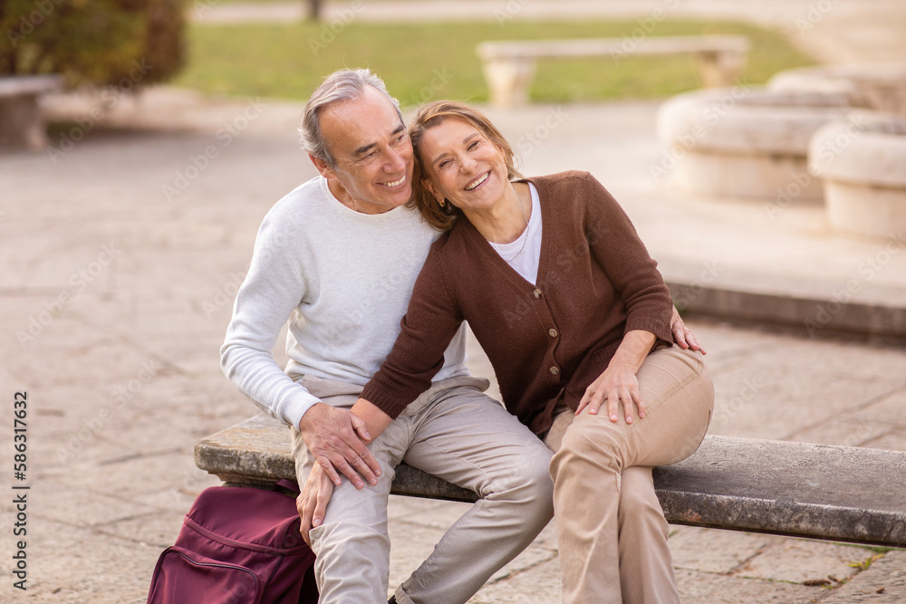Cheerful Senior Husband And Wife Hugging Having Date In Park Cheerful Senior Husband And Wife Hugging Having Date In Park