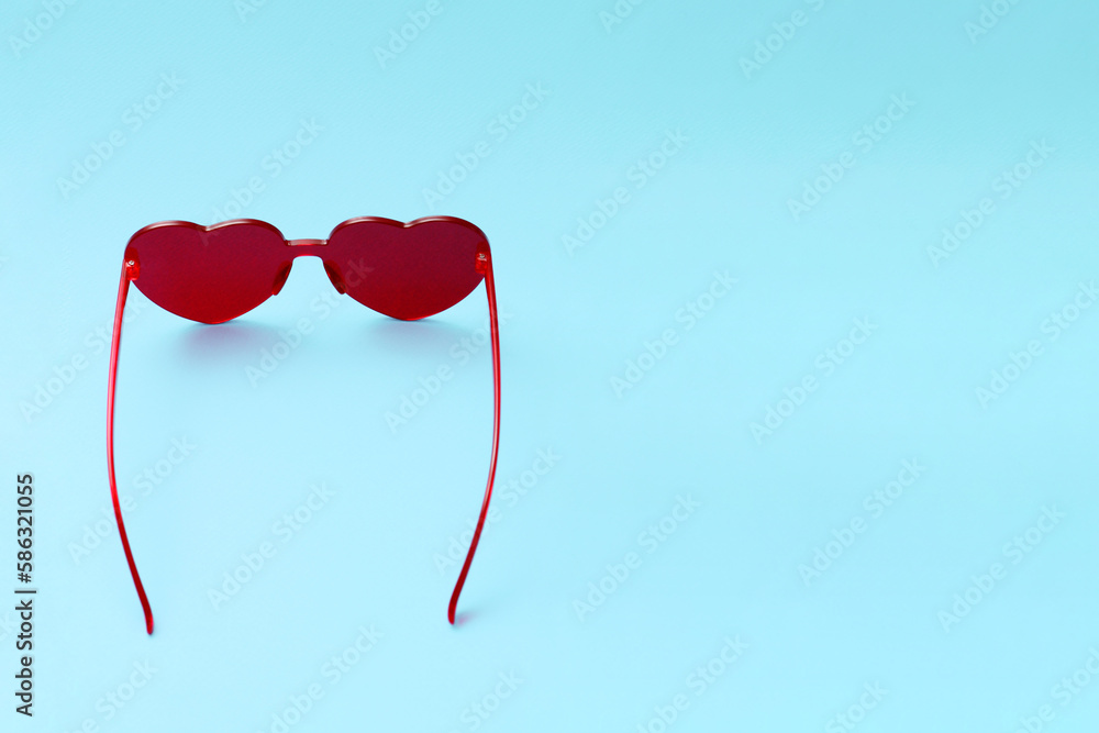 Trendy red sunglasses top view.