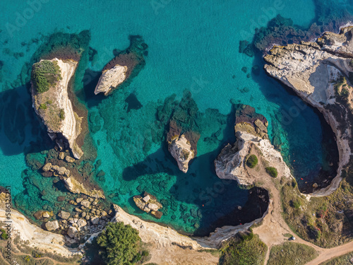 Aerial landscape photography. Straight-down view from flying drone of popular tourist attraction - Torre Sant Andrea. Wonderful morning seascape of Adriatic sea  Apulia region  Italy