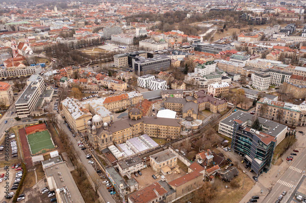 Drone photography of Vilnius city landscape in downtown during cloudy spring day.