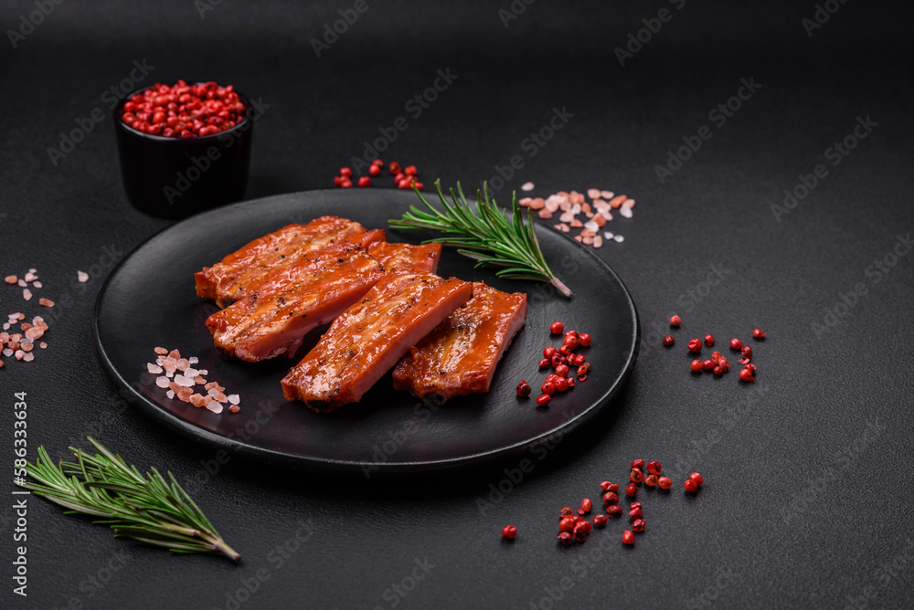 Grilled fresh juicy ribs with salt, spices and herbs Grilled fresh juicy ribs with salt, spices and herbs