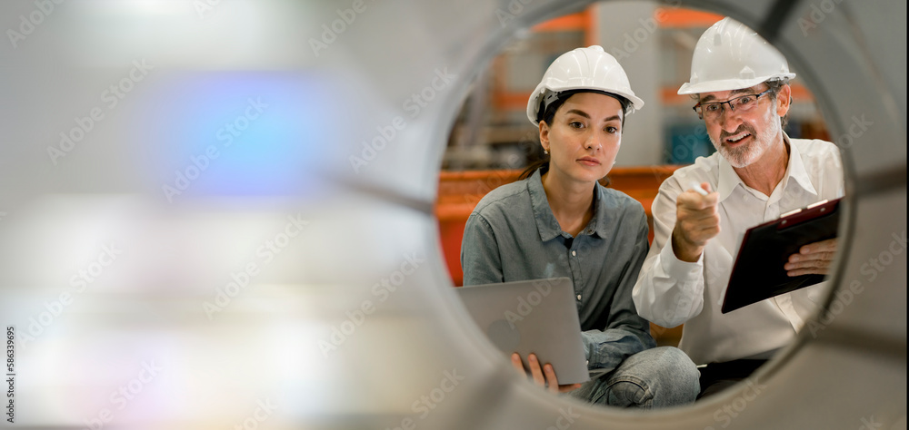 custom made wallpaper toronto digitalPortrait of female engineer team standing and working in industrial factory. Professional engineering, worker, woman Quality control. Male and female industrial engineers using tablet computer.