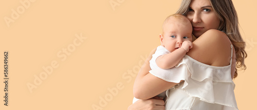 Happy mother with cute litt...