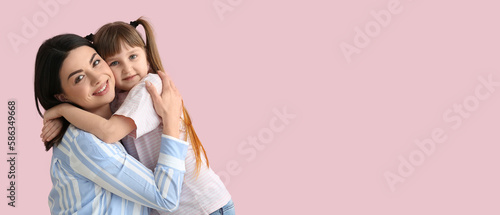 Happy woman with little dau...