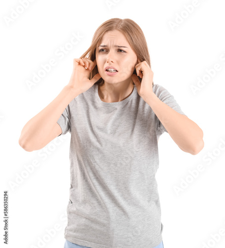 Irritated young woman suffe...