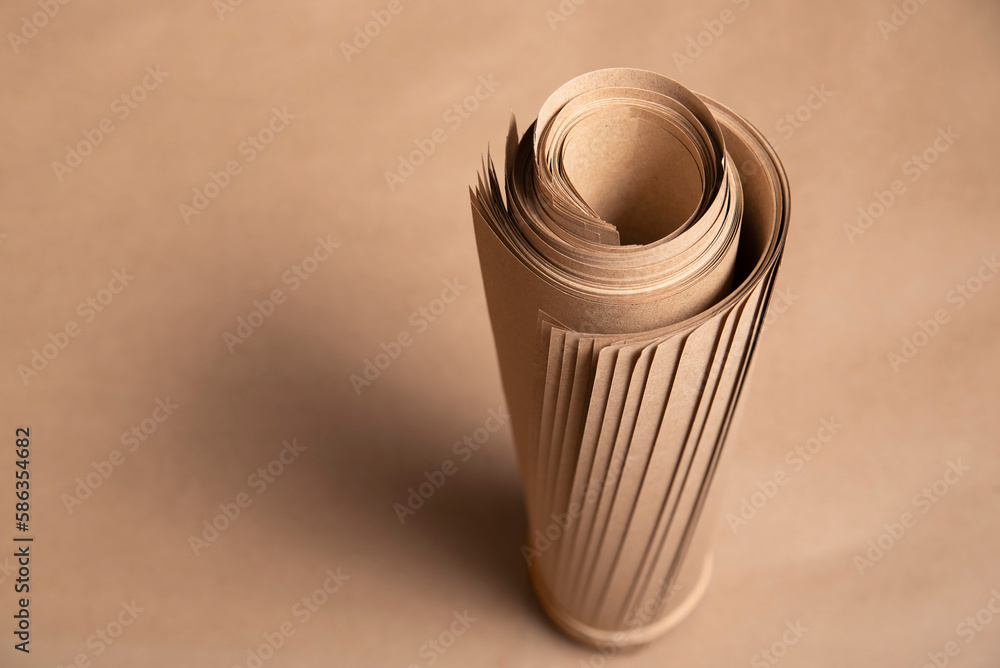 Popular in many fields, kraft paper twisted into a roll, kraft paper for  packing parcels, gifts, food, top view Stock Photo