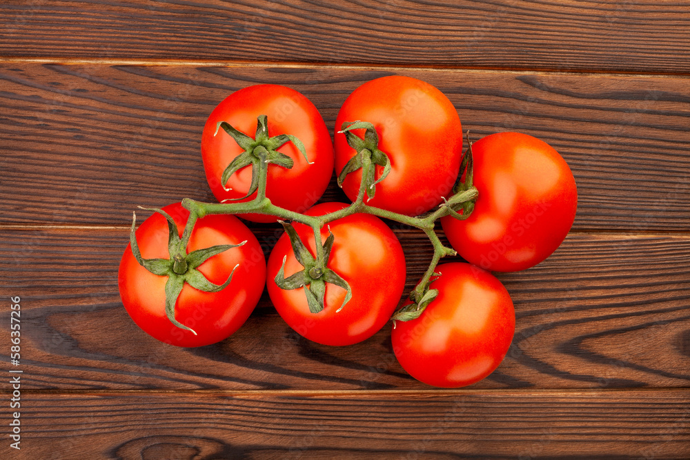 tomato branch on wood background tomato branch on wood background