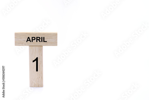 April 8 displayed wooden letter blocks on white background with space for print. Concept for calendar, reminder, date. 