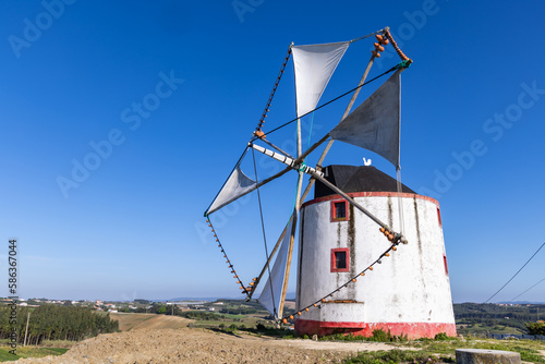 Traditional windmill in the hills of Portugal.