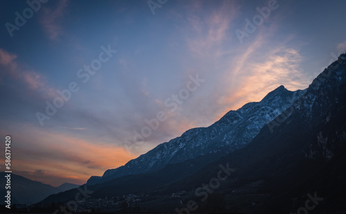 Brenta Dolomites or Dolomiti di Brenta in winter at sunset. View from Trento city. Italy, January 2023