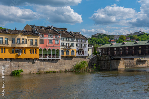 Covered wooden bridge in the town of Lovech in Bulgaria over the Osam river photo