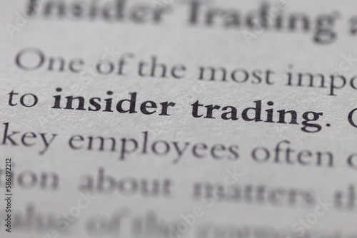 insider trading printed in text on page as visual aid or business law reference