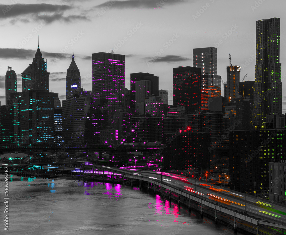 Obraz premium Rainbow colored lights shining on the black and white skyline buildings of New York City at night