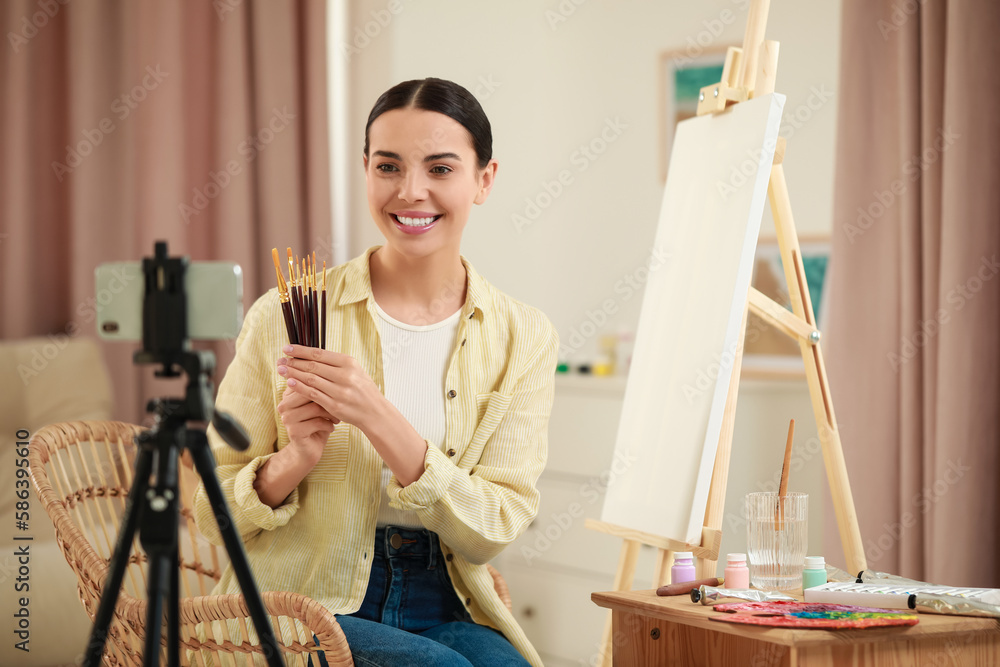 Teacher conducting online painting lesson at home. Time for hobby Teacher conducting online painting lesson at home. Time for hobby