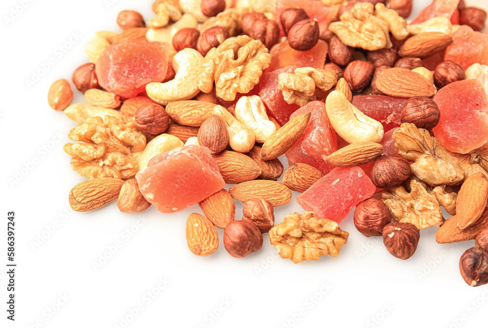 Different tasty nuts and dried papayas on beige background, space for text Different tasty nuts and dried papayas on beige background, space for text