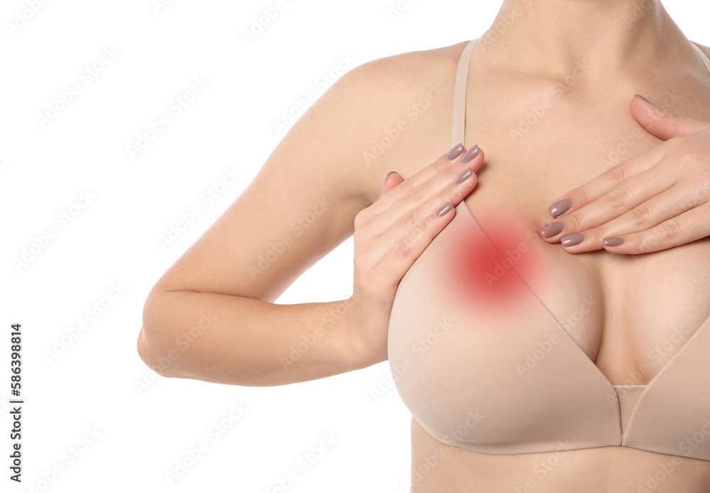 Woman checking her breast on white background, closeup