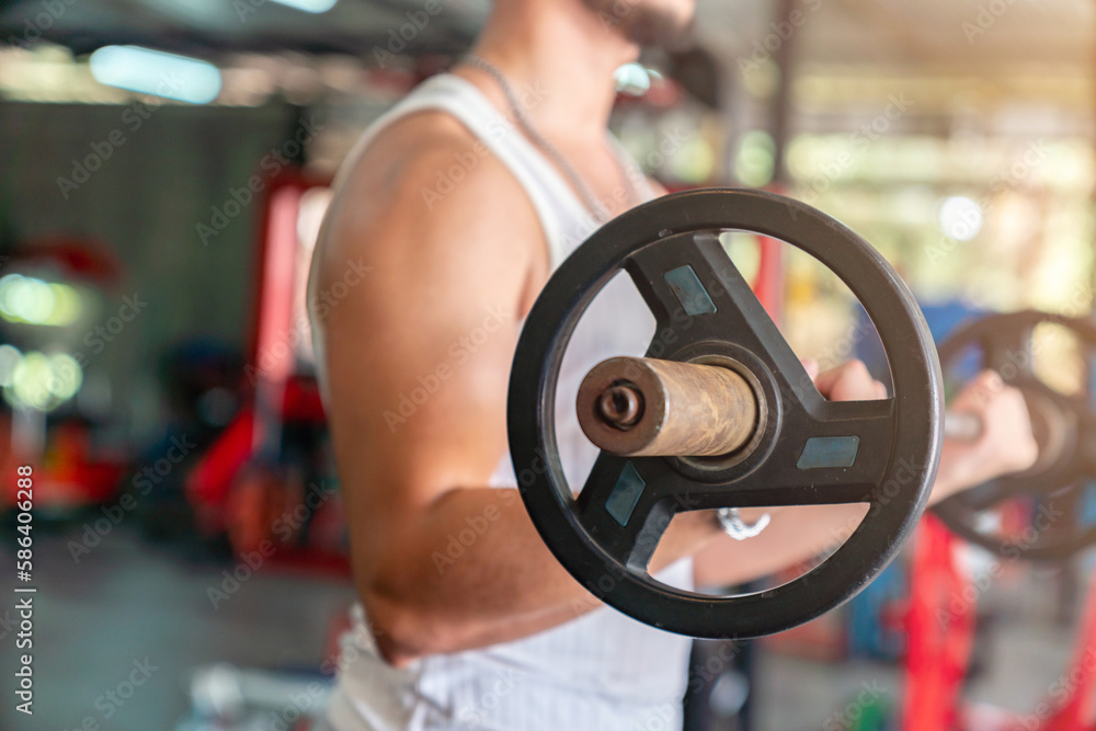 Obraz premium Fit doing deadlift exercise.