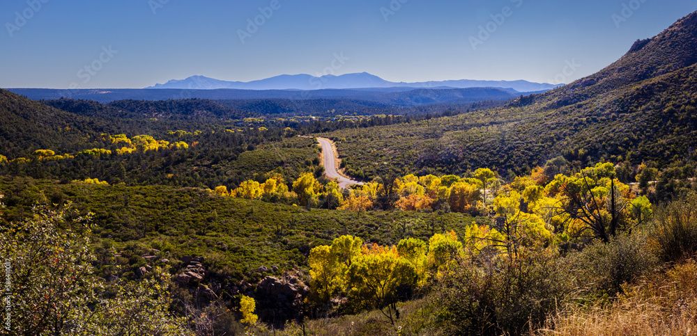 Houston Mesa Road winds along the East Verde River and Ellison Creek in the Fall near Payson, Arizona.
