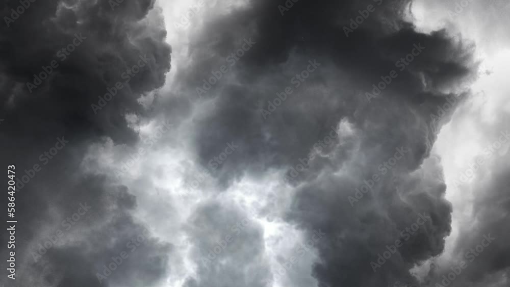 a thunderstorm flashed across the dark clouds