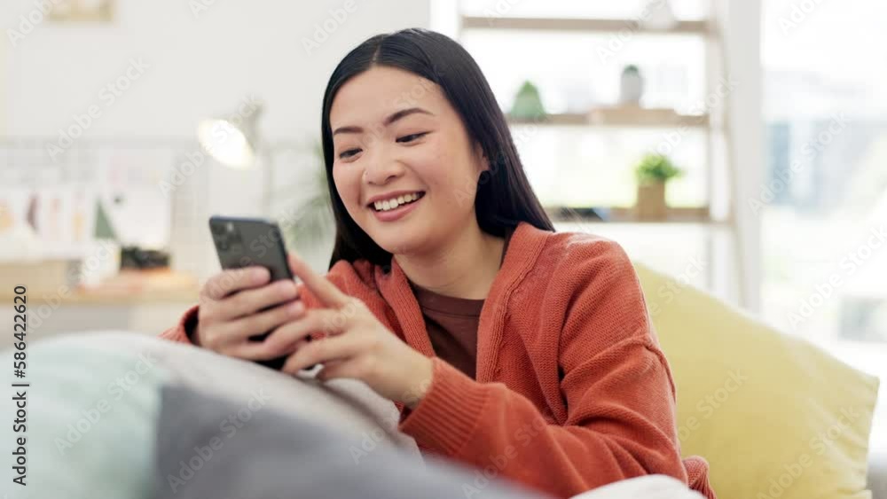 Asian woman, smartphone and laughter at funny meme on social media with communication and chat. Happy female using phone, typing and relax on sofa, comedy online and connectivity with technology Asian woman, smartphone and laughter at funny meme on social media with communication and chat. Happy female using phone, typing and relax on sofa, comedy online and connectivity with technology