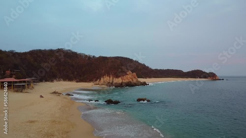 drone footage panoramic view of huatulco oaxaca mexico summer travel destination tropical beach sea sunset
