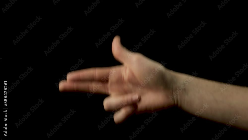 Revealing shot of a man holding up finger gun sign with his hands Revealing shot of a man holding up finger gun sign with his hands