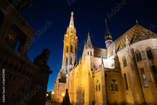 St. Matthias Church in Budapest illuminated at night.