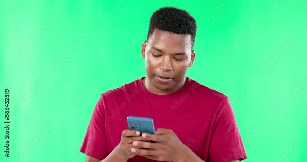 Phone, bad news and disappointment with a frustrated black man in studio on a green screen background. Social media, mobile and an unhappy male reading a negative text message on chromakey mockup Phone, bad news and disappointment with a frustrated black man in studio on a green screen background. Social media, mobile and an unhappy male reading a negative text message on chromakey mockup