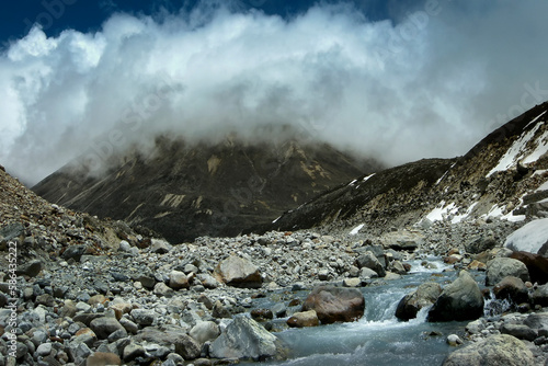 Ice cold Lachung river flowing out of glacier at Yumesamdong, Zero point, Sikkim, India. Altitude of 15,300 feet, last outpost of civilization and there is no road ahead. India China border,Himalayas.